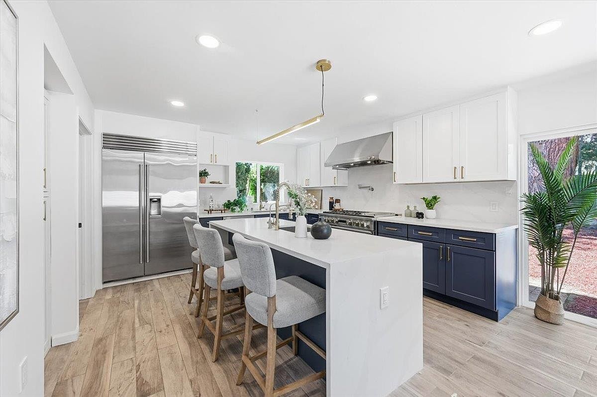 Staged kitchen with navy and white cabinetry, modern farmhouse in Sunnyvale