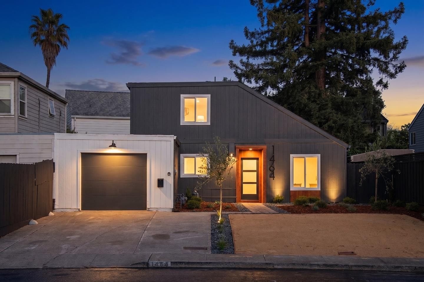 Exterior at dusk, terracotta remodel in Petaluma