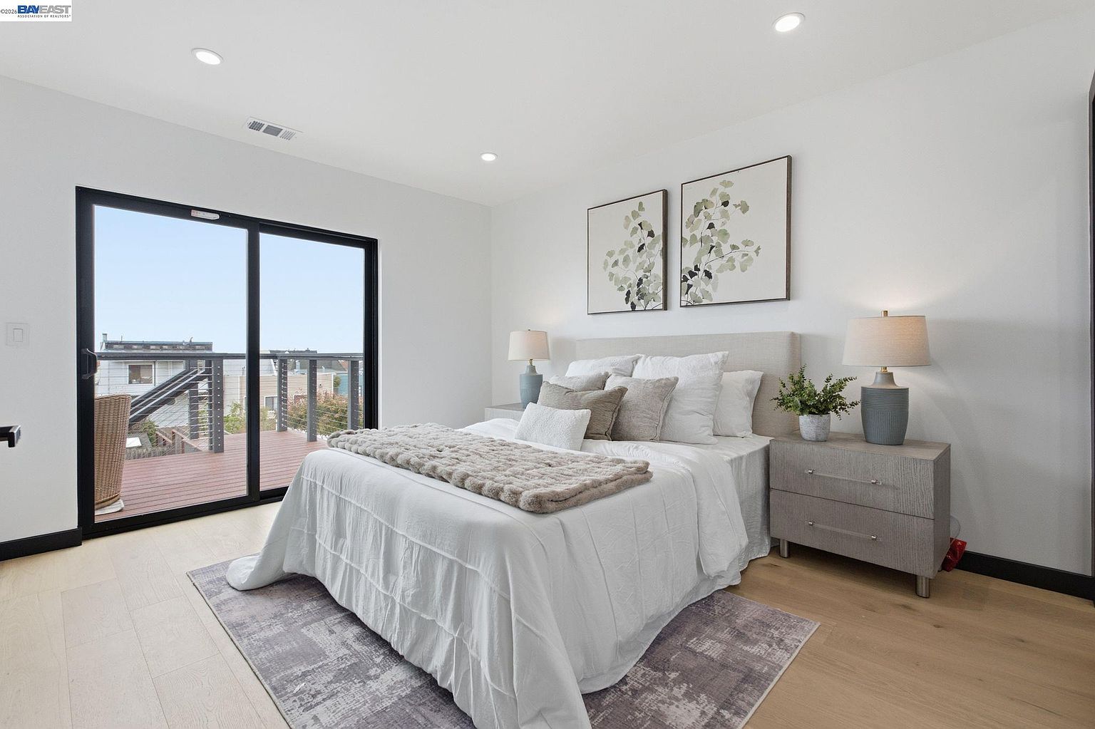 Staged primary bedroom, modern rebuild in San Francisco