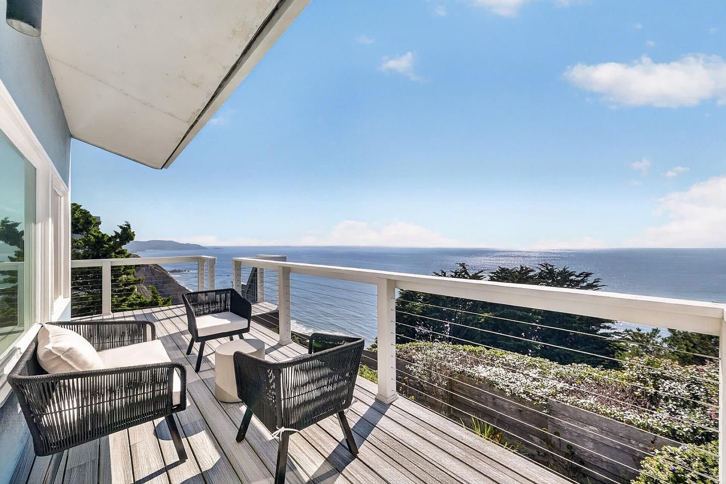 Styled oceanfront deck, coastal modern staging in Daly City